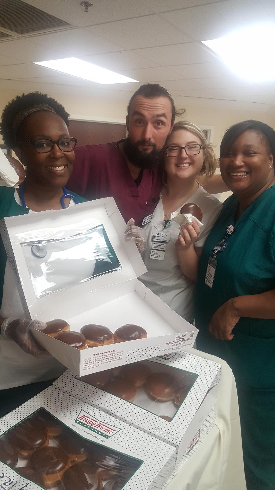 Springtree team celebrating National Cream Filled Donut Day