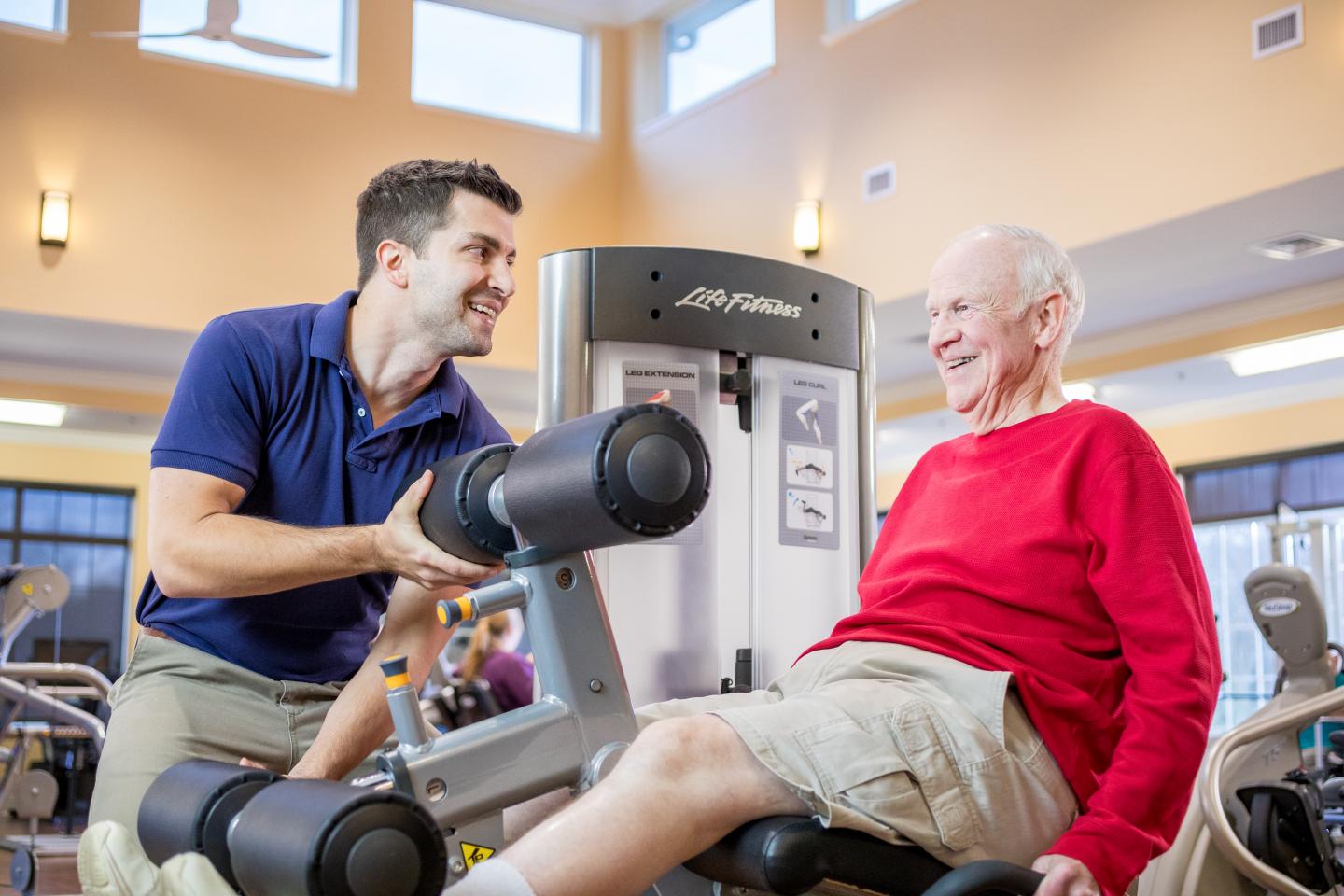 BJ Ewell with a LifeWorks Rehab Therapist